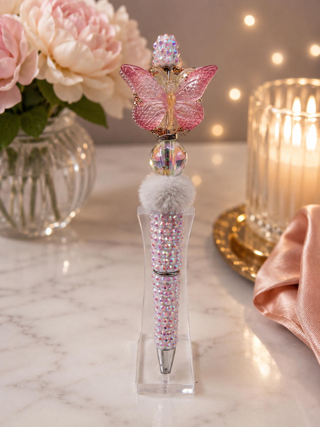 White beaded pen with pink butterfly