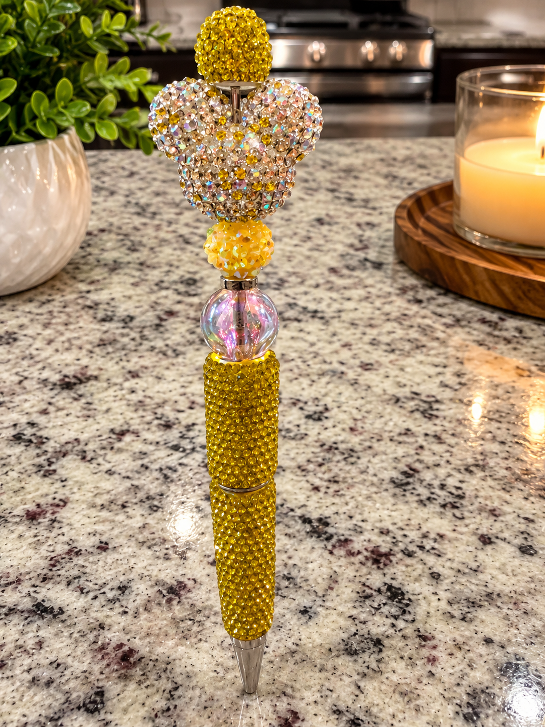 Yellow beaded pen with cat ears