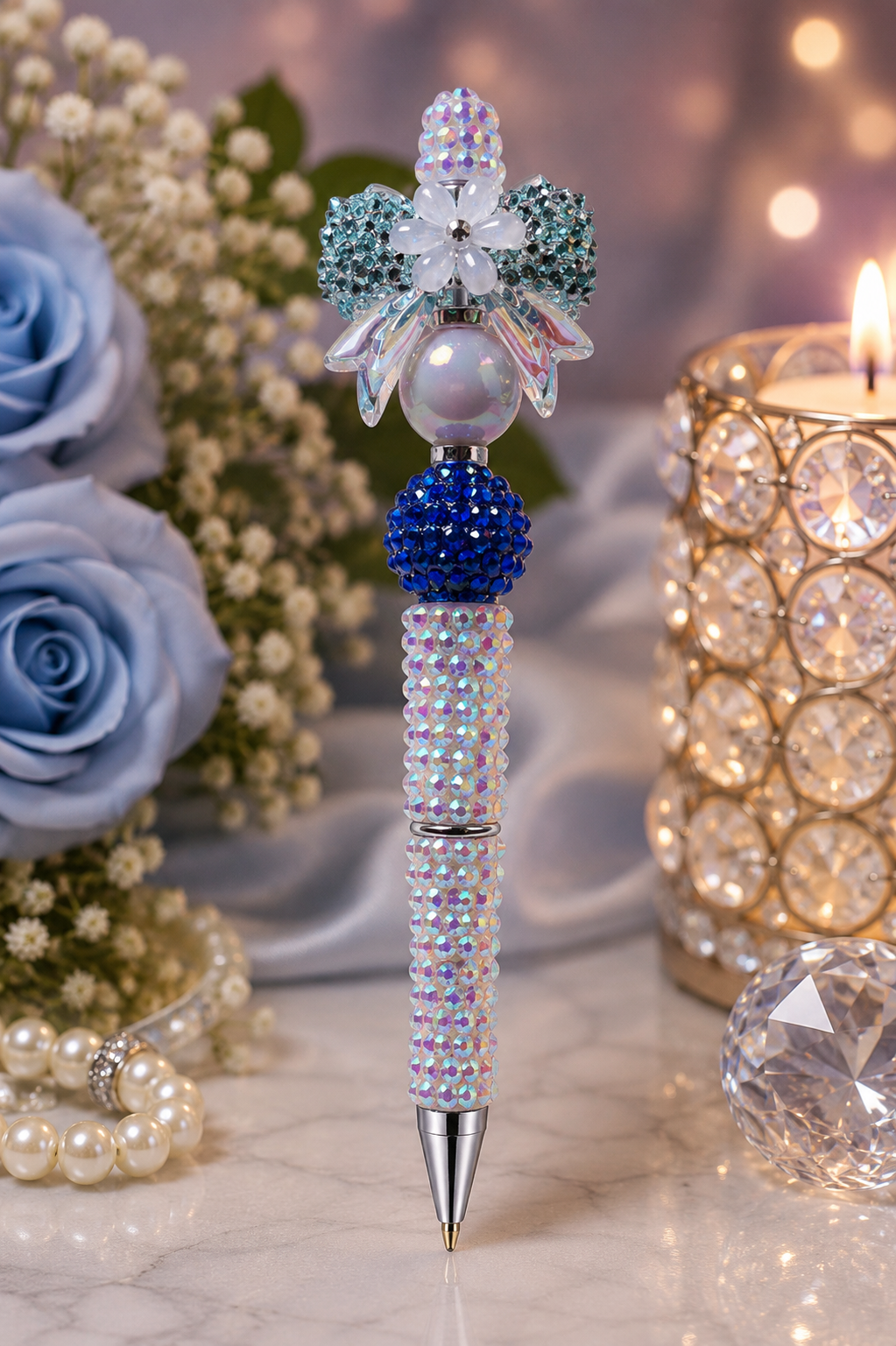 White beaded pen with blue focal bead
