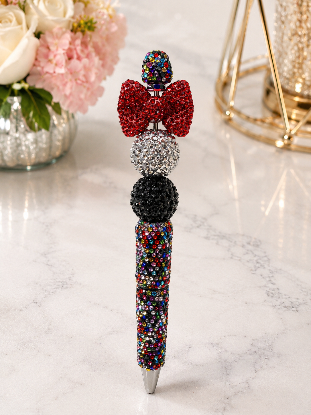 Multicolored beaded ink pen with red bow