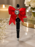 Black beaded pen with jumbo red bow focal bead