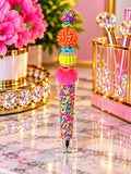 Rainbow rhinestone beaded pen with hot pink fluffy accent and orange yellow colorful crystal beads