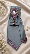 Gray Necktie with Pink Brooch